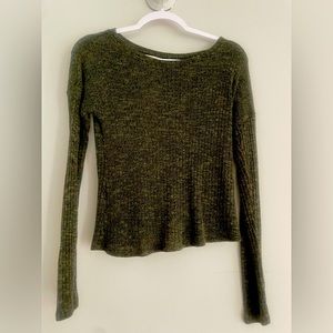 Lovely green blouse with an opening in the back